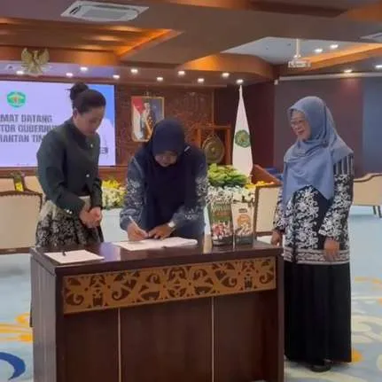 Qisbelin MoU signing with an Australian partner