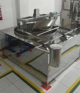 Stainless-steel cooking kettle in the production room